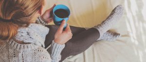 woman-in-winter-clothing-indoors