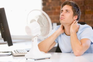 overheated-person-in-front-of-a-fan